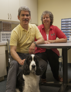 Dr. Elliot Waterman, O.D., with His Wife and Dog